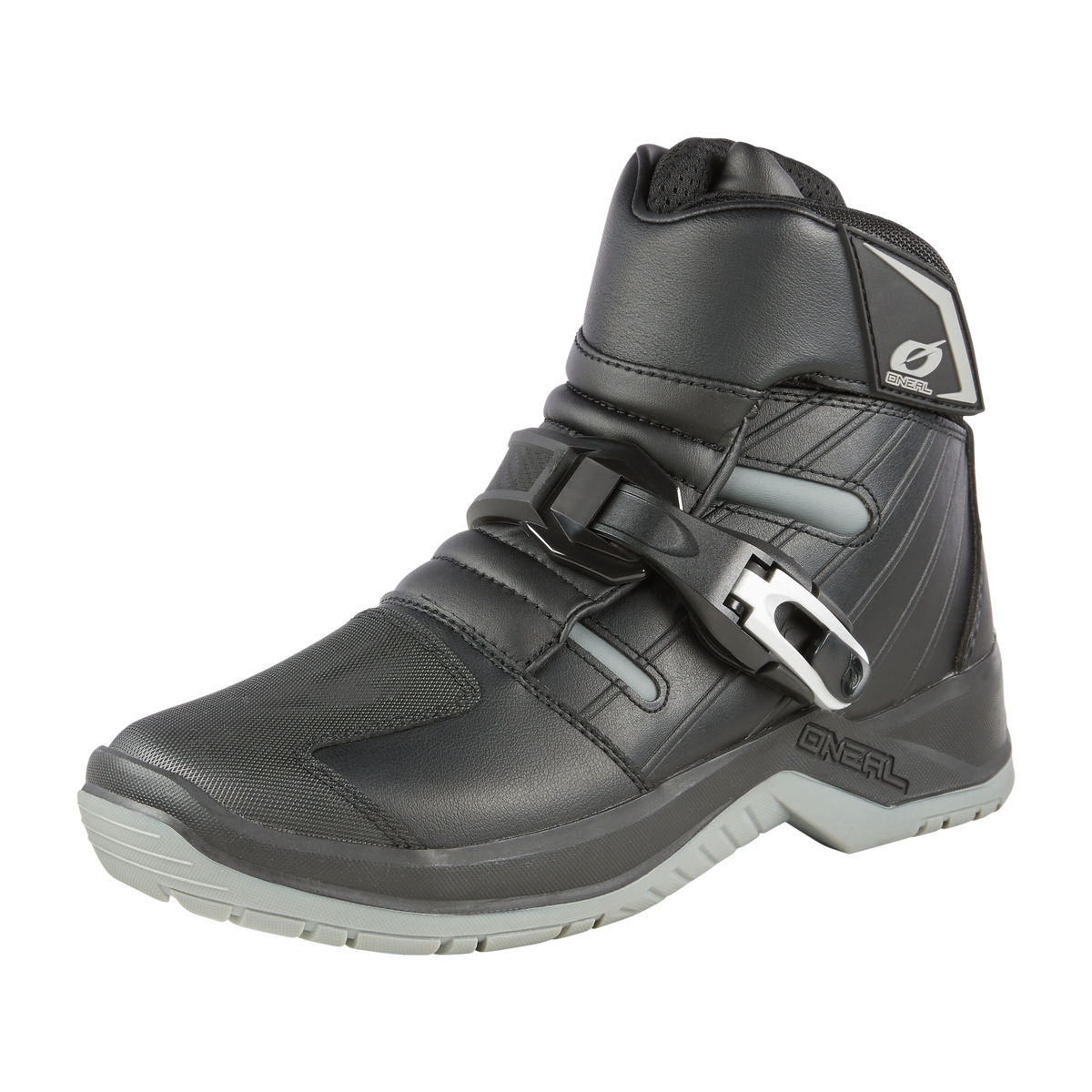 Der O'NEAL RMX SHORTY Stiefel von O'NEAL ist ein schwarz-grauer Motorradstiefel mit verstärkter Zehenpartie, Knöchelstütze und verstellbarem Schnallenriemen - ideal für Fahrer, die bequemes Schuhwerk, robusten Halt und Sicherheit suchen.