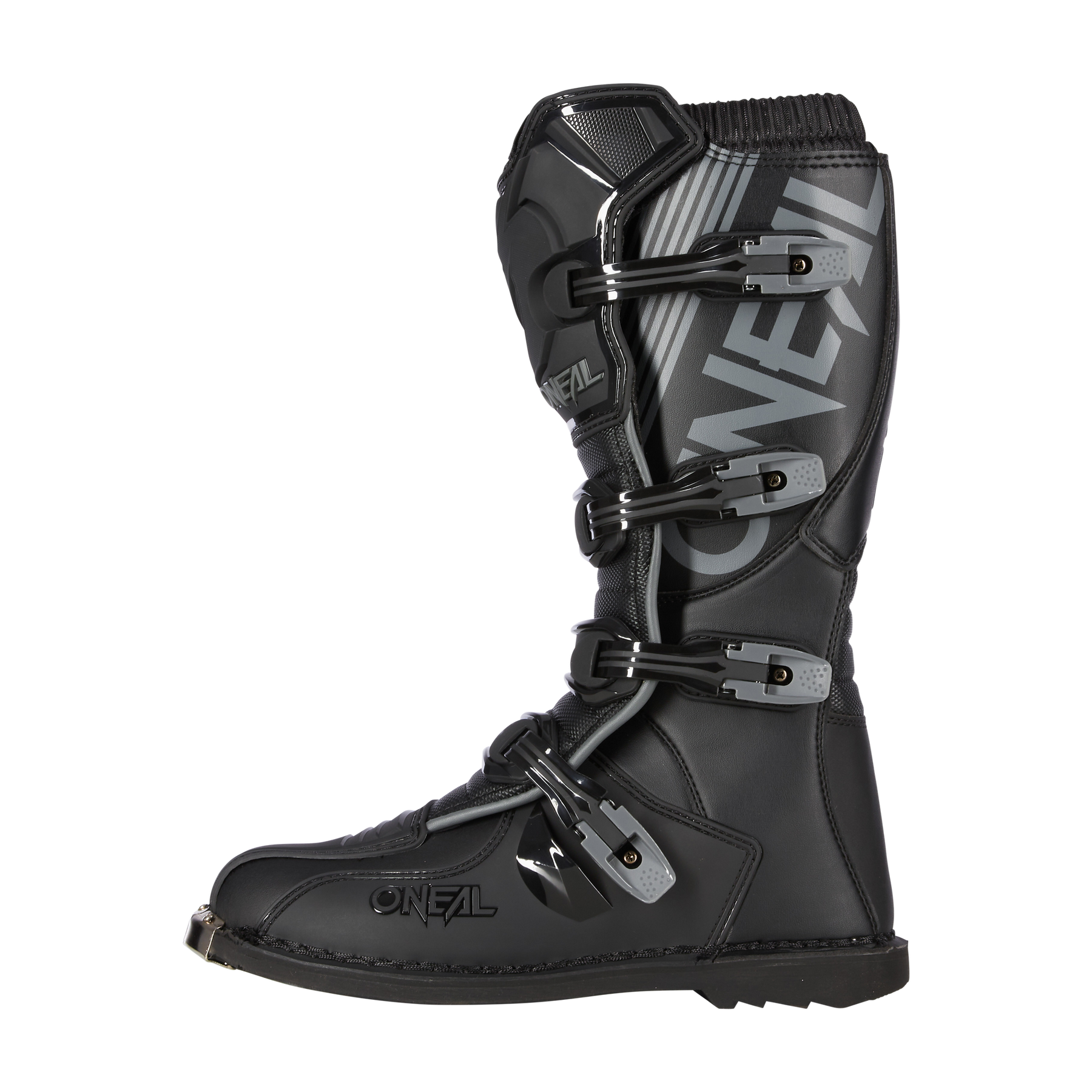 Der O'NEAL TRIBUTE Stiefel ist ein schwarz-grauer Motorsportstiefel mit vier verstellbaren Schnallen, einer verstärkten Schienbeinplatte und einem auffälligen "O'NEAL"-Branding an der Seite.