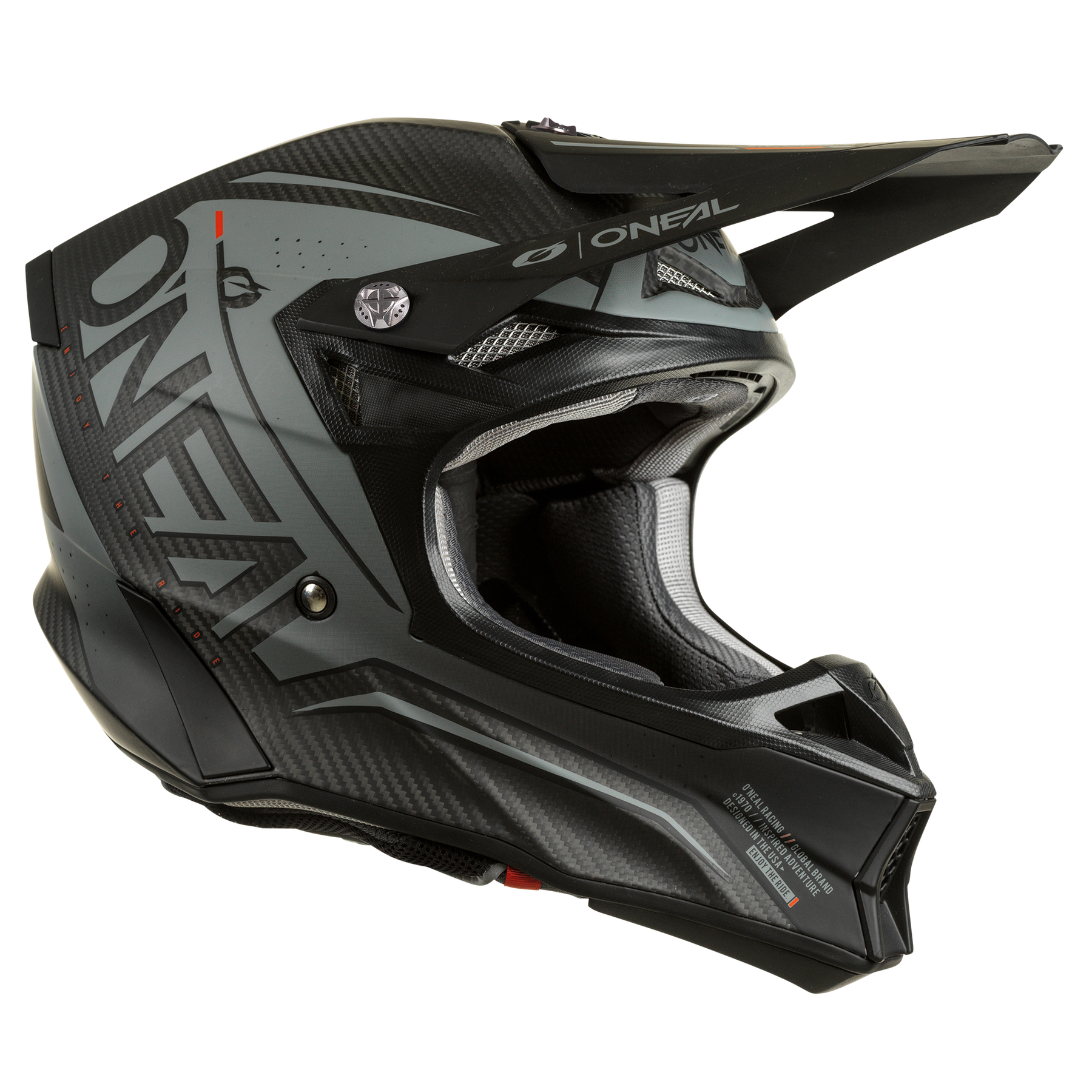 Der O'NEAL 10SRS Carbon Helm PRODIGY ist ein schwarz-grauer Integralhelm mit Visier, Belüftungsöffnungen, auffälligem O'NEAL-Branding und einer leichten Außenschale aus Kohlefaser.