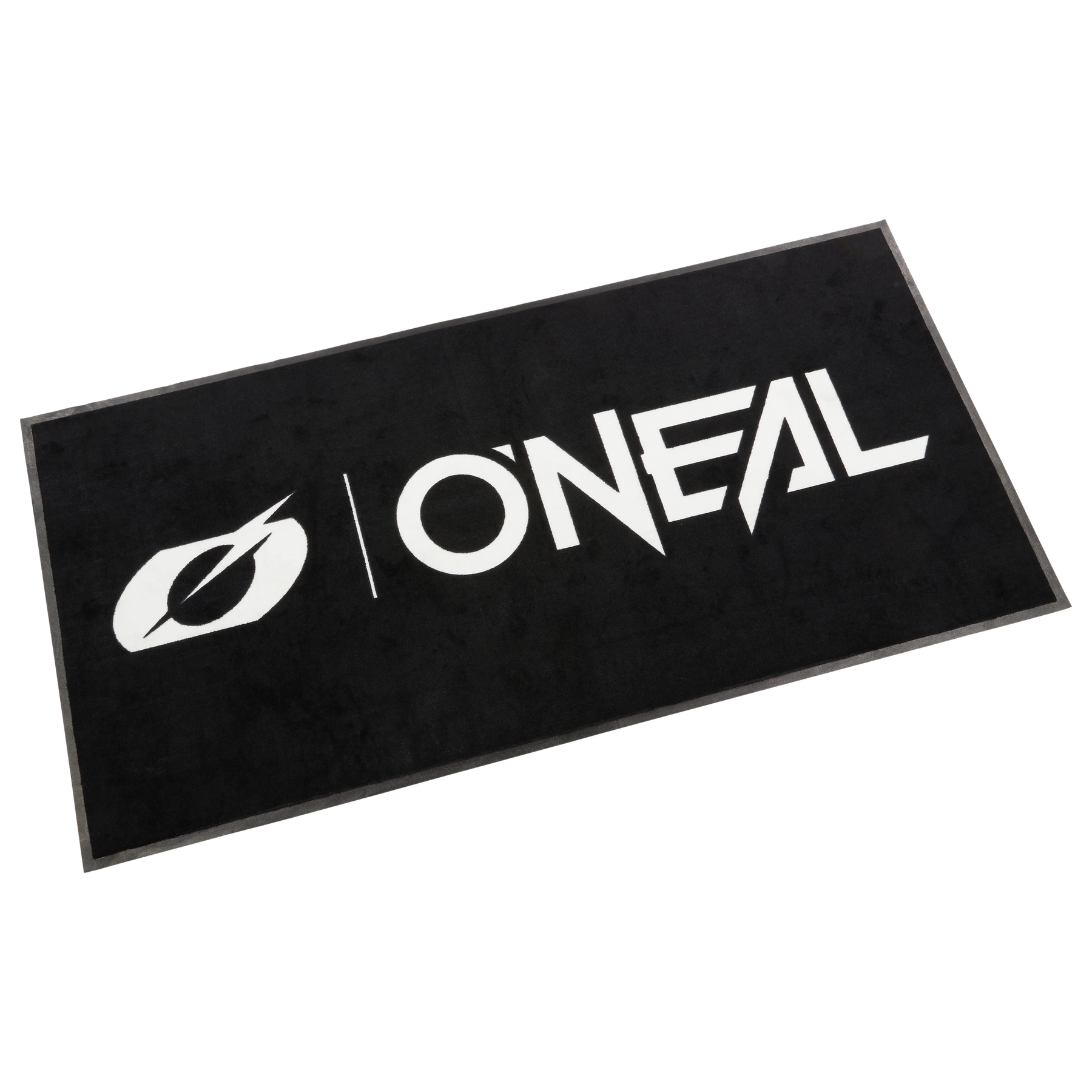Der O'NEAL-Teppich ist eine rechteckige schwarze Matte mit dem Schriftzug "O'NEAL" und einem stilisierten "O"-Logo in fetten weißen Buchstaben in der Mitte.