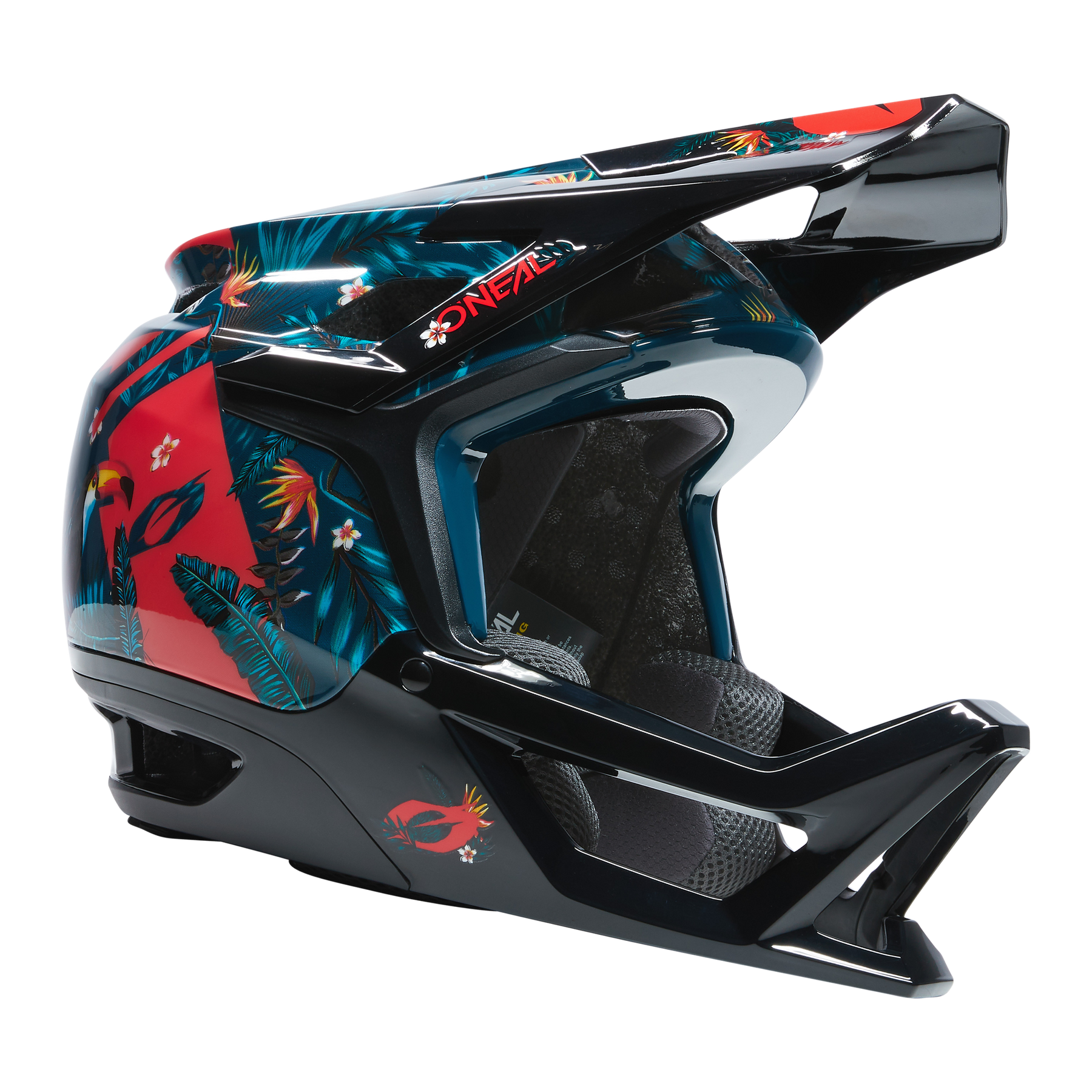 Der O'NEAL TRANSITION TwiceMe Helm RIO verfügt über einen Vollgesichtsschutz, ein Visier und einen Kinnschutz in Schwarz mit auffälligen roten und blauen tropischen Blumenmustern - im Profil auf einem einfarbigen Hintergrund dargestellt.