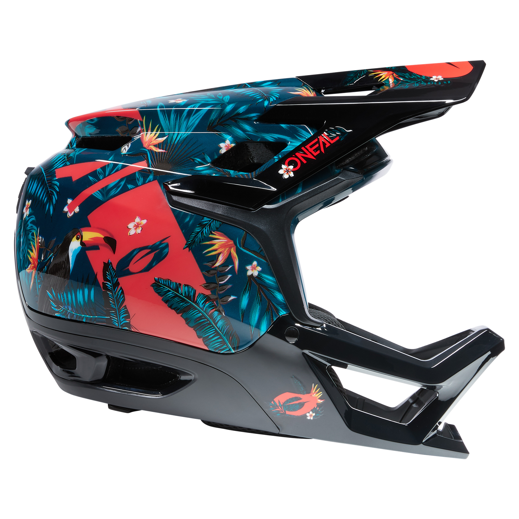 Der O'NEAL TRANSITION TwiceMe Helmet RIO ist ein schwarzer Integralhelm mit einem tropischen Tukan-, Palmenblatt- und Blumendesign, das optimalen Schutz und Stil kombiniert. Das "O'NEAL"-Logo ist an der Seite angebracht.