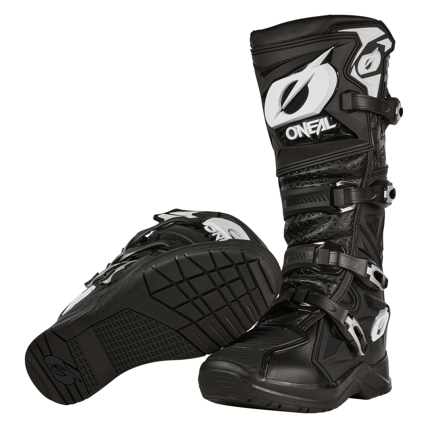 Ein Paar schwarze O'NEAL RMX PRO Stiefel Motocross-Stiefel mit weißem O'NEAL-Branding, verstellbaren Schnallen, verstärkten Sohlen und strukturierten Platten für Schutz und Halt. Ein Stiefel ist aufrecht; der andere liegt auf der Seite.