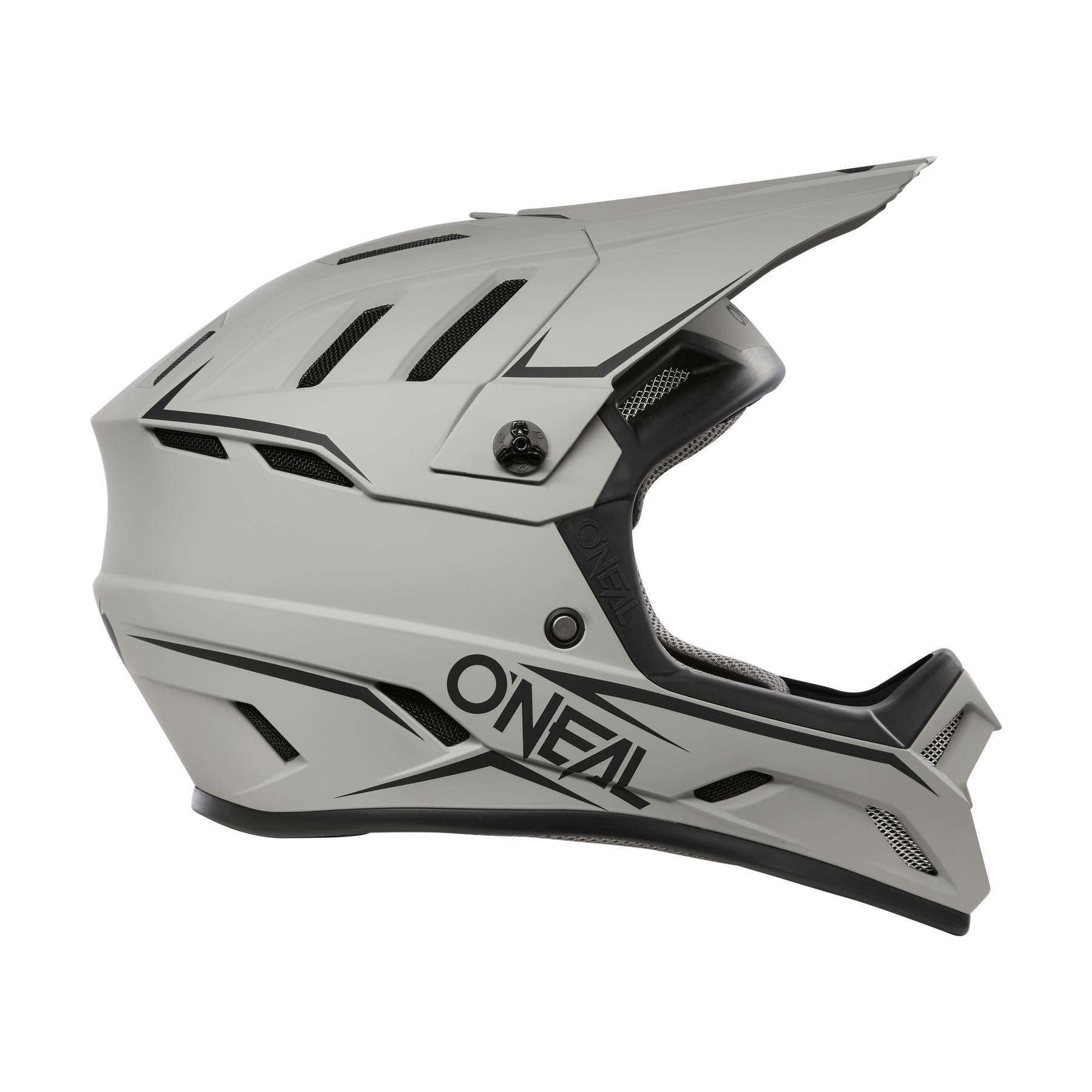 Der O'NEAL BACKFLIP Helm SOLID ist ein mattgrauer Vollvisier-MTB-Helm mit schwarzen Belüftungsöffnungen und auffälligem O'NEAL-Branding an der Seite - ideal für Motocross- oder Mountainbike-Abenteuer.