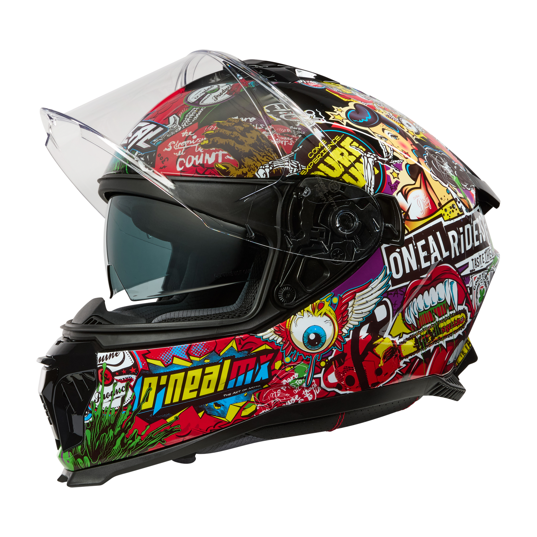 Der O'NEAL CHALLENGER Helm CRANK, ein farbenfroher Vollvisier-Motorradhelm mit auffälligen Aufklebern und grafischen Motiven - Augen, Münder, Text und abstrakte Muster - ist mit einem durchsichtigen Visier ausgestattet und wird vor einem schwarzen Hintergrund dargestellt.