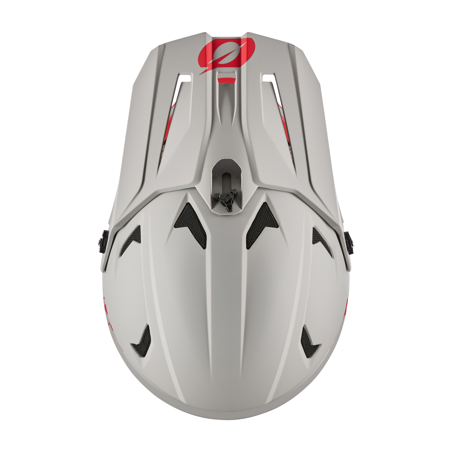 Die Draufsicht auf den O'NEAL SONUS Helm SOLID in Weiß zeigt schwarze Belüftungsöffnungen, seitliche Riemen, ein rotes, kreisförmiges Frontlogo und aerodynamische Rillen für MTB-Performance.