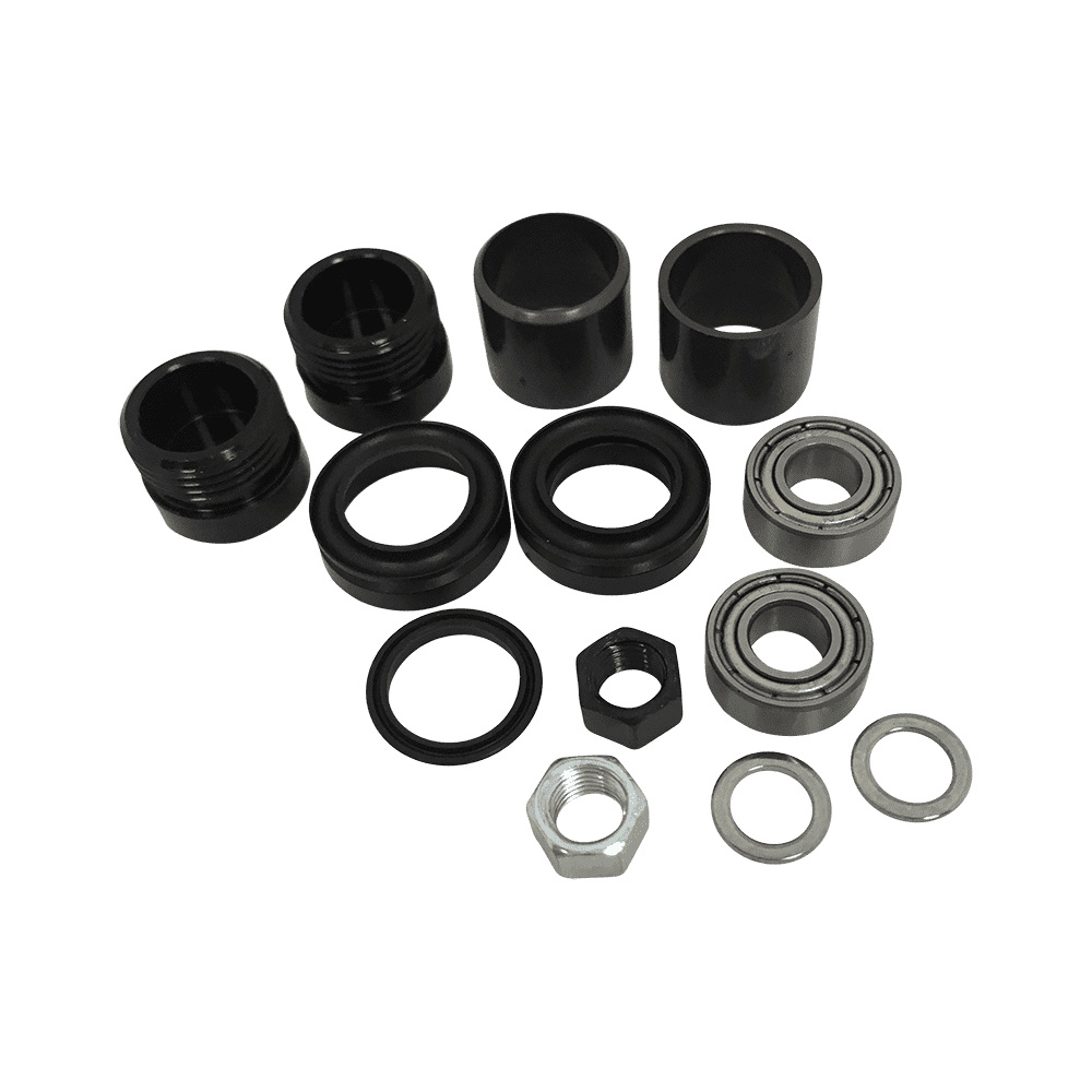 AZONIC Central Axle Instruction Combo Set Americana Pedalkomponenten, einschließlich schwarzer zylindrischer Teile, Metalllager, Sechskantmuttern und Unterlegscheiben, sind auf einem einfarbigen Hintergrund angeordnet.