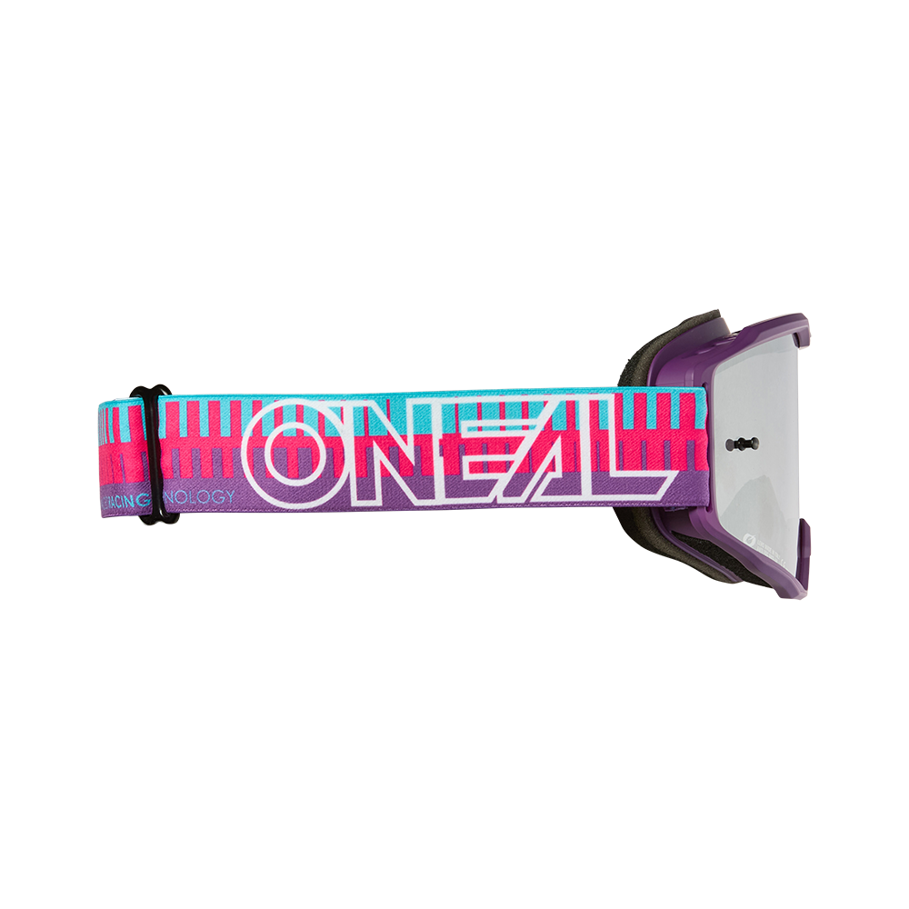 Die O'NEAL B-10 Youth Goggle STRIPED hat ein leuchtendes lila, pinkes und blaugrünes Muster mit einem auffälligen weißen O'NEAL-Logo auf dem Band und schwarzen Verstellbeschlägen.