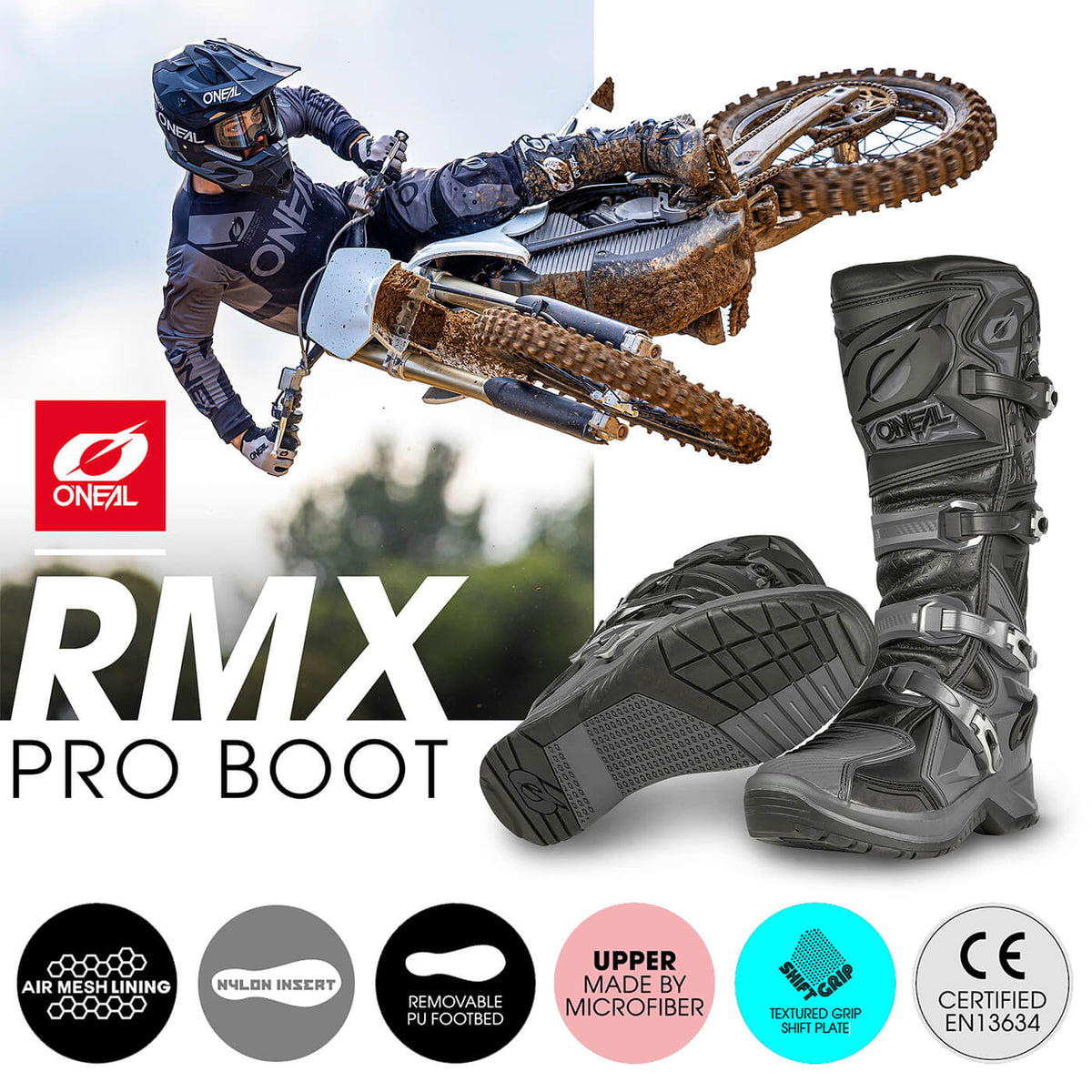 Ein Motocrossfahrer mit Helm und Ausrüstung macht einen Hochsprung auf einem Dirtbike. Im Vordergrund ist ein Paar O'Neal RMX Pro Boots in Grau mit unten hervorgehobenen Merkmalen zu sehen, darunter Air-Mesh-Futter, Nylon-Einsatz, herausnehmbares PU-Fußbett und Obermaterial aus Mikrofaser.