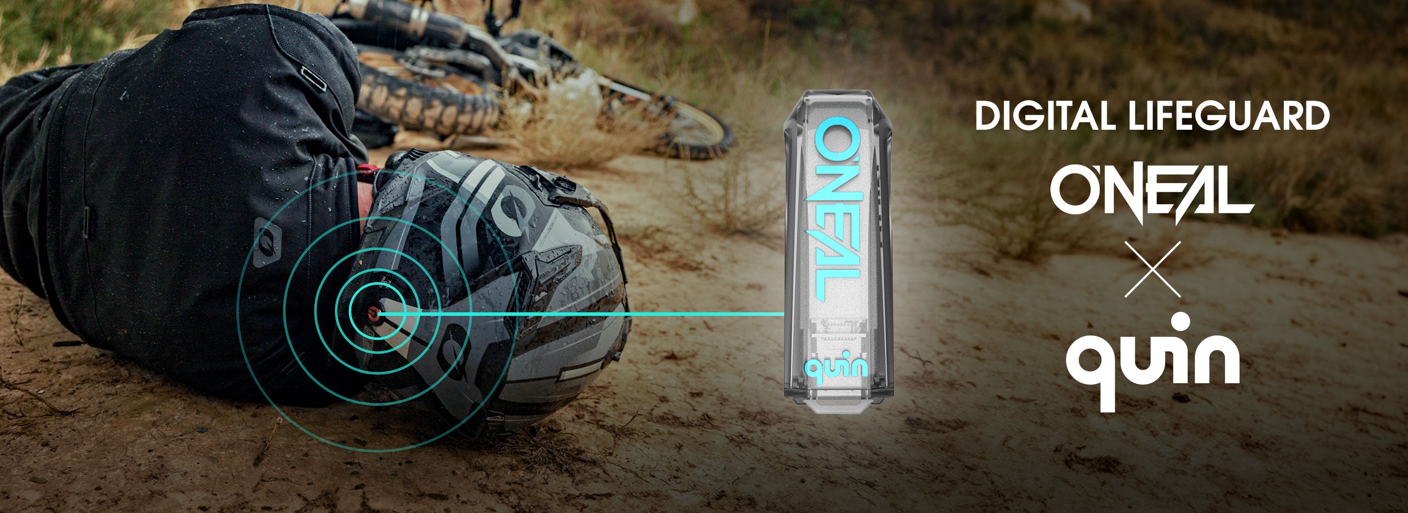 Ein Radfahrer in Schutzkleidung liegt auf dem Boden, auf seinem Arm ist ein digitales Gerät hervorgehoben; der Text lautet „DIGITAL LIFEGUARD ONEAL x quin.“.