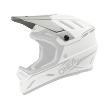 Der O'NEAL Visor BACKFLIP Helm SOLID von O'NEAL ist in Grau abgebildet. Er hat ein Visier, eckige Belüftungsöffnungen, eine ABS-Kunststoffschale und eine graue Polsterung, von der Seite gesehen auf einem schlichten weißen Hintergrund.