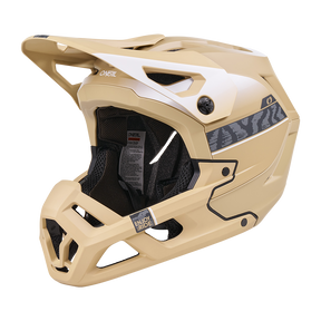 Der O'NEAL SL1 Helm TERRA ist ein sandfarbener Fullface-Mountainbike-Helm mit schwarzer Innenausstattung, Belüftungsöffnungen, Visier, dezenten Seitenstreifen und Branding - bietet optimalen Schutz als Ausrüstung für anspruchsvolles Terrain.