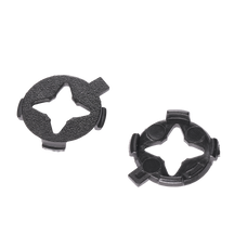 O'NEAL 3SRS Peak Lock Washer Set - Two black, star-shaped plastic fasteners with round bases and three small notches, suitable for 3SRS helmets from 2026. O'NEAL brand quality. Supplied as a set of 2 on a white background.