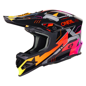 Der O'NEAL F-SRS Helm CRUX hat eine schwarze Schale mit kantigen neonorangen, pinken, gelben und grauen Grafiken, ein großes Visier und den Schriftzug O'NEAL" in Orange an der Seite.