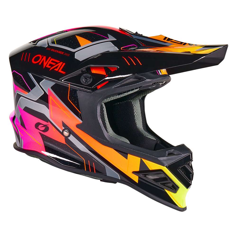 Der O'NEAL F-SRS Helm CRUX ist ein schwarzer Motocross-Helm mit Visier, der auffällige geometrische Motive in Orange, Gelb, Pink, Weiß und Grau sowie den Schriftzug O'NEAL" in Rot an der Seite aufweist.