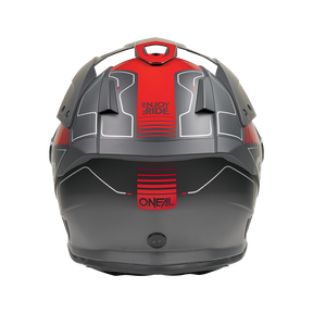 Ein grauer und roter O'NEAL SIERRA RS Helm ECHO, von hinten gesehen, mit eckigem Design, Lüftungsöffnungen und "ENJOY THE RIDE" sowie "O'NEAL" in rot - das ist der kühne Helm von O'NEAL.