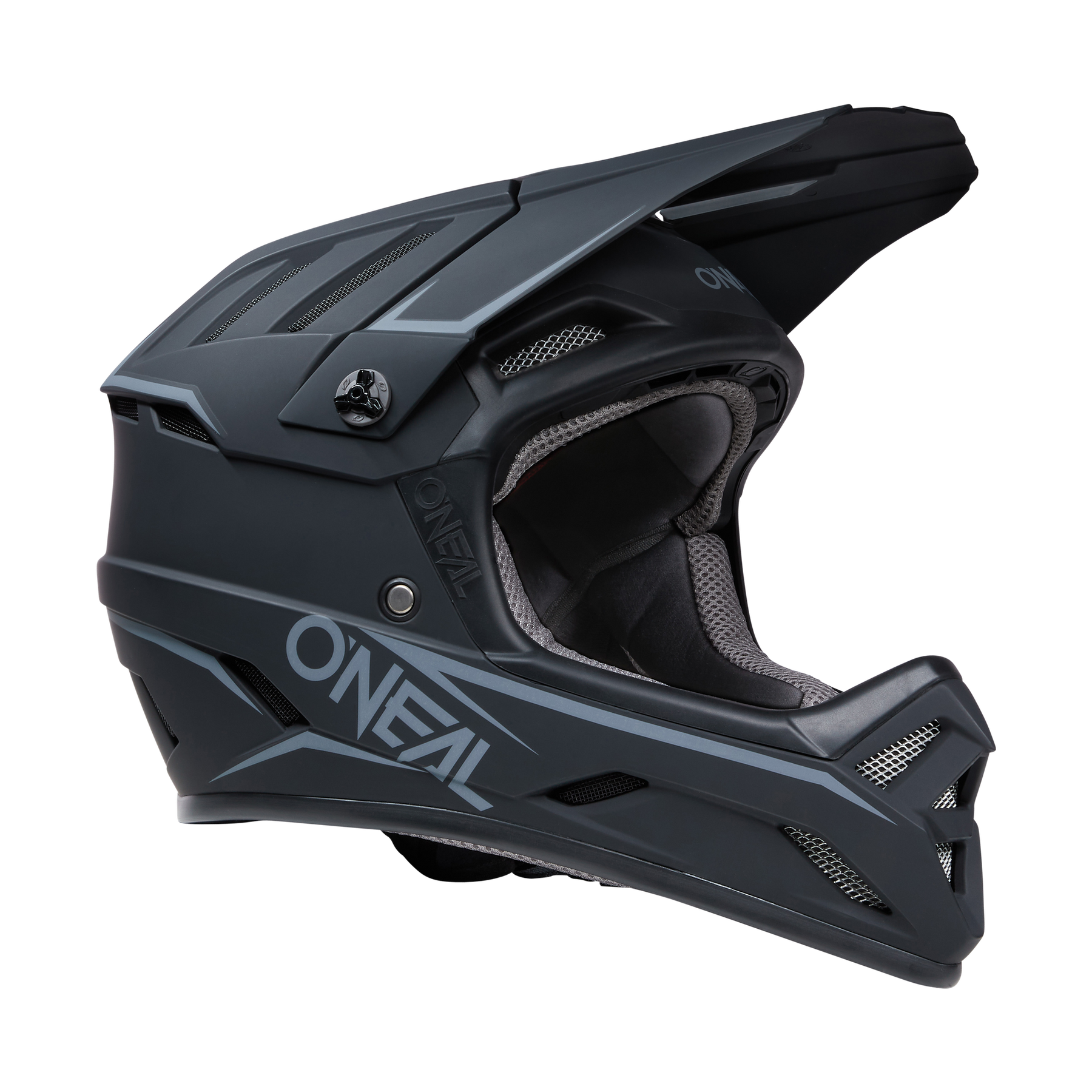 Ein mattschwarzer O'NEAL BACKFLIP Helm SOLID mit stromlinienförmigem Design mit Belüftungslamellen und „O'NEAL“-Branding an der Seite. Dieser Integralhelm für MTB ist für Komfort und Schutz mit gepolstertem Material gefüttert und damit die ideale Wahl für Mountainbike-Experten, die Sicherheit suchen.
