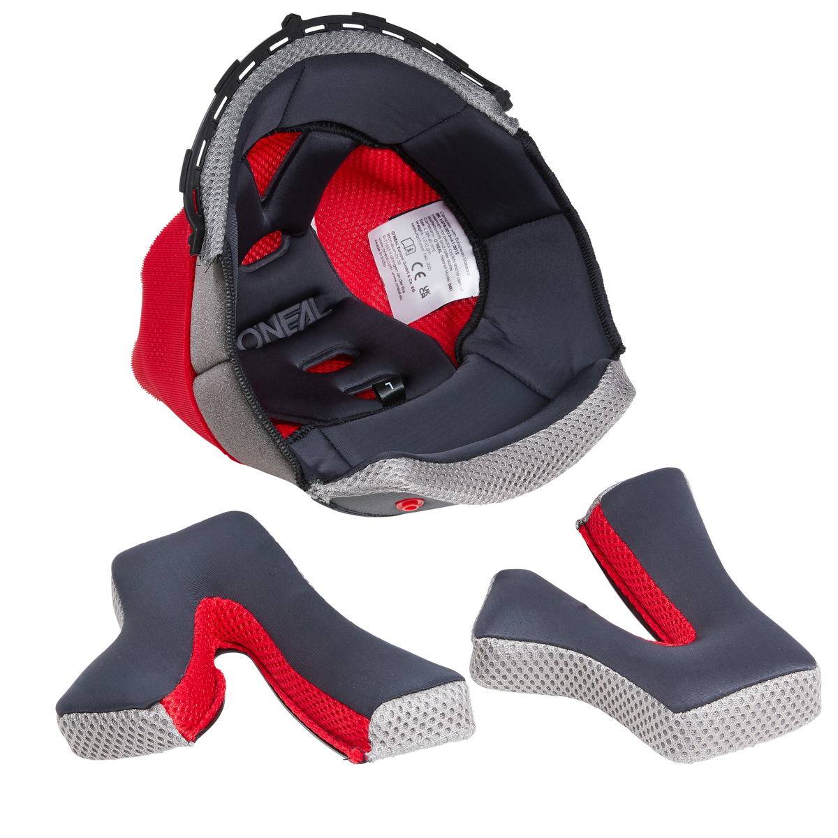 Ein O'NEAL Liner & Cheek Pads SONUS Helm mit fester Polsterung wird mit seinen einzelnen Innenteilen vor einem weißen Hintergrund abgebildet. Die Komponenten sind dunkelgrau mit einem roten Innenfutter aus Mesh und mit weißen Kanten strukturiert, während das O'NEAL-Label im Inneren des Helms sichtbar, aber nicht vollständig lesbar ist.