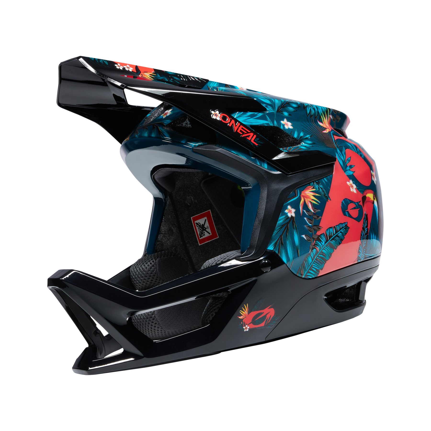Der O'NEAL TRANSITION Helm RIO ist ein schwarzer Integralhelm mit einem lebendigen tropischen Design mit bunten Blumen und Blättern sowie roten Akzenten. Der Helm trägt das O'NEAL-Branding in Rot auf der Vorderseite und der rechten Seite. Seine gepolsterte Innenseite bietet optimalen Schutz und ein Sicherheitszertifizierungsaufkleber ist innen sichtbar.