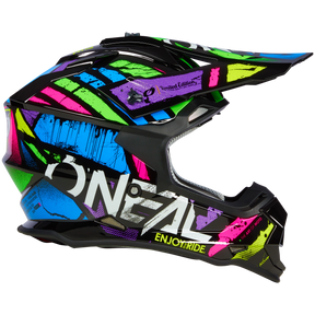 Wir präsentieren den O'NEAL 2SRS Helm GLITCH in limitierter Auflage, einen lebendigen Motocross-Helm mit schwarzer Basis und kräftigen Spritzern in Blau, Pink, Grün und Gelb. Er zeigt abstrakte Muster sowie „ENJOY RIDE“ auf der Seite.