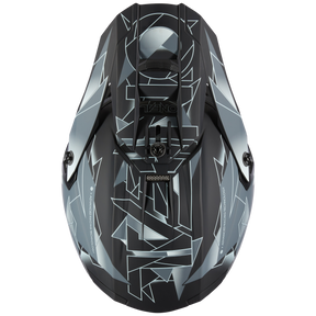 Eine Draufsicht auf den eleganten O'NEAL 5SRS Polyacrylite Helm SURGE zeigt eckige, geometrische Muster in Weiß und Grau. Das Design zeichnet sich durch scharfe Linien und Winkel aus, die ihm ein modernes und kantiges Aussehen verleihen. Dieser hochwertige Helm verfügt über eine Belüftung an der Oberseite und sichtbare Markenelemente.