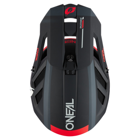 Eine Draufsicht auf einen eleganten, schwarzen O'NEAL BLADE Polyacrylite Helm HAZE mit der weißen Aufschrift „O'NEAL“ auf der Vorderseite. Der Helm verfügt über rote und weiße Akzente, ein belüftetes Design und Markenetiketten, darunter „VENO“ und „SINNERS“ an den Seiten. Dieser O'NEAL BLADE Polyacrylite Helm ist perfekt für jeden Mountainbike-Profi und sorgt für Stil und Sicherheit.