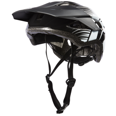 Der O'NEAL MATRIX Helm SPLIT von O'NEAL ist ein schwarz-weißer Helm mit Visier, Belüftungsöffnungen und verstellbaren Kinnriemen, dargestellt von der Seite auf einem einfarbigen Hintergrund.