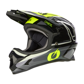 Ein stylischer schwarz-neongelber Integralhelm O'NEAL SONUS SPLIT mit markantem Visier, Belüftungsschlitzen und schlankem aerodynamischem Design. Dieses hochwertige Produkt trägt den Markennamen „O'NEAL“ an der Seite und hinten.