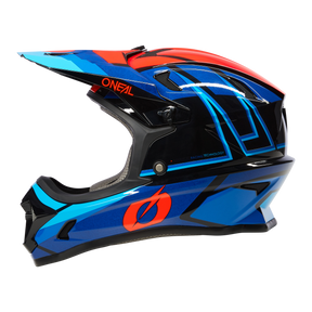 Der O'NEAL SONUS Helm SPLIT ist ein lebendiger Integralhelm für Mountainbikes mit Visier und präsentiert ein überwiegend blaues Farbschema mit auffälligen roten und schwarzen Akzenten. Dieses hochwertige Produkt trägt den Markennamen „O’NEAL“ deutlich sichtbar auf der Seite und verfügt über grafische Designs sowie mehrere Belüftungsbereiche.
