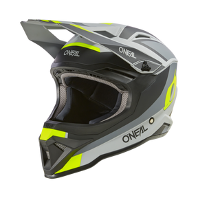 Der O'NEAL 1SRS Helm STREAM ist ein Integralhelm mit einem eleganten Design in den Farben Schwarz, Grau, Weiß und Neongelb. Er zeichnet sich durch hochwertige Verarbeitung mit markantem Visier, robustem Kinnschutz, mehreren Belüftungsöffnungen und dem „O'Neal“-Branding sowie geometrischen Akzenten aus.