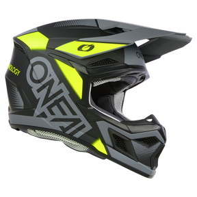 Der O'NEAL 3SRS Helm VISION, ein schwarz-grauer ABS-Helm mit neongelben Akzenten und einem markanten „O'Neal“-Logo, verfügt über ein Visier, einen Kinnschutz und Belüftungsöffnungen. Dieser schlanke, eckige Motocross-Helm ist auf aerodynamische Effizienz und Fahrerschutz ausgelegt.