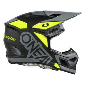 Der O'NEAL 3SRS Helm VISION ist ein Motorradhelm mit einem auffälligen schwarz-gelben Design. Er verfügt über ein großes Visier, Belüftungsöffnungen und trägt das auffällige „ONEAL“-Logo an der Seite, während auf der Rückseite „TECHNOLOGY“ steht. Dieser ABS 3SRS MX Helm ist perfekt für Motocross und verfügt über ein modernes, kantiges Design.