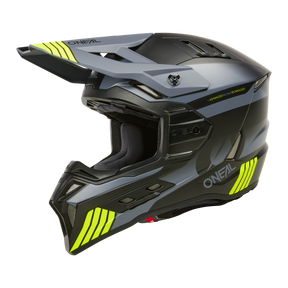 Seitenansicht des O'NEAL EX-SRS Helms HITCH in Schwarz und Grau mit gelben Akzenten und einem aerodynamischen Design. Dieser Helm von O'NEAL verfügt über ein ausgeprägtes Visier, Belüftungsöffnungen mit Airflaps und ein bequem gepolstertes Innenleben, perfekt für ganztägige Fahrsessions.