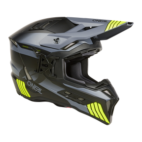 Der O'NEAL EX-SRS Helm HITCH besticht durch ein auffälliges schwarz-graues Design mit leuchtend gelben Akzenten. Dieser elegante Helm verfügt über ein verlängertes Visier und einen stabilen Kinnschutz, der das „O'NEAL“-Logo sowohl an der Seite als auch an der Oberseite prominent zur Schau stellt. Mit Airflaps zur Belüftung und einem gepolsterten Innenraum ist er perfekt für ganztägige Fahrsessions geeignet.