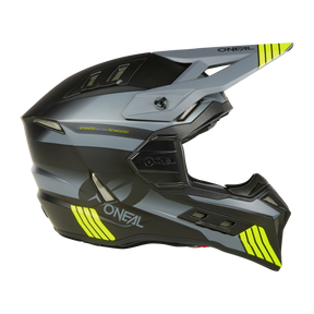 Ein mattschwarzer und grauer O'NEAL EX-SRS Helm HITCH mit leuchtend gelben Akzenten, ideal für ganztägige Fahrsessions. Dieser Integralhelm für Motocross verfügt über ein markantes Visier, aerodynamisches Design, Airflaps für verbesserte Belüftung und das „O'Neal“-Branding neben dem Text „Advanced Racing Technology“.