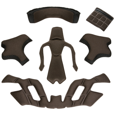 Zahlreiche gepolsterte und belüftete Polsterteile, Teil des O'NEAL Liner & Cheek Pads SL1 Helms, sind sauber auf einer flachen Oberfläche angeordnet. Diese Komponenten sind so konzipiert, dass sie den Komfort und den Schutz im Helm verbessern. Die Polster sind aus einem dunklen, atmungsaktiven Netzgewebe gefertigt.