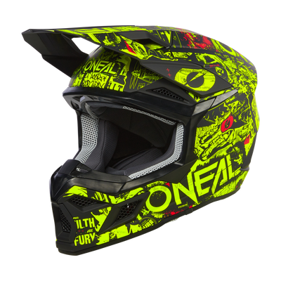 Der O'NEAL 3SRS Helm Kinder ATTACK ist ein Motocross-Helm mit schwarzer Basis, verziert mit neongelben und roten Grafikdesigns. Der Helm trägt den Markennamen „O'NEAL“ auf der Seite und verfügt über eine eckige, aggressive Form mit Visier und Belüftungsöffnungen.