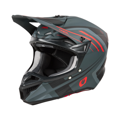 Der O'NEAL 5SRS Polyacrylite Helm SPIKE, ein schwarz-grauer Integralhelm mit roten Akzenten, verfügt über ein Visier, mehrere Belüftungspunkte und ein schlankes, aerodynamisches Design. Er ist mit einer Innenpolsterung für Komfort und Sicherheit ausgestattet und zeigt hochwertige Technik mit dem O'Neal-Logo an der Seite.