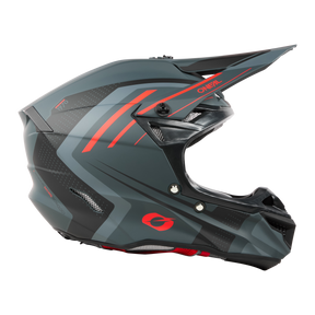 Der O'NEAL 5SRS Polyacrylite Helm SPIKE, ein eleganter Helm in mattem Grau und Schwarz mit auffälligen roten Akzenten, besticht durch ein modernes Design. Er zeichnet sich durch hochwertige Technik mit einem markanten Visier, ausreichender Belüftung und auffälligen geometrischen Mustern für Stil und Schutz aus.