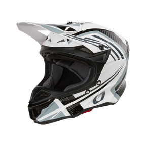Der O'NEAL 5SRS Polyacrylite Helm SPIKE ist ein eleganter Integralhelm für Motocross mit geometrischem Design in Weiß und Schwarz. Er verfügt über ein markantes Visier, einen Kinnschutz mit mehreren Belüftungspunkten und ein gepolstertes Innenfutter. Die scharfen Linien und Formen verleihen ihm ein modernes, aerodynamisches Aussehen.