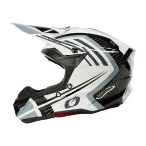Ein eleganter, weißer O'NEAL 5SRS Polyacrylite Helm SPIKE mit geometrischen Mustern in Schwarz und Grau. Das Design umfasst dynamische Linien und Formen und sorgt für einen modernen, sportlichen Look. Die hochwertige Konstruktion verfügt über einen starken Kinnschutz, ausreichend Belüftung und ein schwarzes Visier.