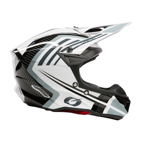 Ein weiß-schwarzer O'NEAL 5SRS Polyacrylite Helm SPIKE mit aerodynamischem Design und geometrischen Mustern. Der Helm verfügt über Belüftungsöffnungen, ein markantes Visier und einen sicheren Kinnschutz, alles optimiert für den Schutz des Fahrers und Hochleistungstechnik.