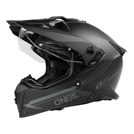 Le casque noir mat O'NEAL A-SRS SOLID dispose d'une visière claire, d'un profil aérodynamique avec des lignes anguleuses, de fentes latérales fines, d'un logo O'NEAL et est compatible Bluetooth. Fabriqué en fibre de verre pour les motards.