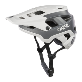Der O'NEAL DEFENDER Helm SOLID in Grau/Schwarz ist ideal für All-Mountain-Fahrten und verfügt über ein Visier und verstellbare schwarze Kinnriemen für einen sicheren Sitz mit „O'NEAL“ an der Seite.