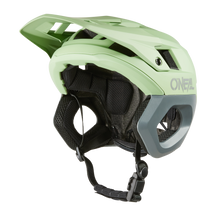 https://cdn.oneal.eu/assets/_default_upload_bucket/2025_ONeal_TRAPPER%20Helmet%20SOLID%20V.25_green_gray_front.png