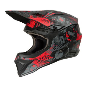 The O'NEAL 1SRS helmet VIBRANT is characterized by a black and red design with eye-catching, edgy graphics, the "ONEAL" lettering, the "OFF ROAD" text and various stylized patterns and symbols on the shell.