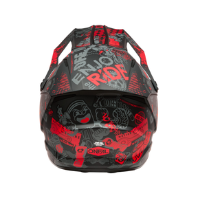 The O'NEAL 1SRS Helmet VIBRANT by O'NEAL is a black top-view motocross helmet adorned with vibrant red and gray graffiti graphics, including text, cartoon faces and abstract designs.