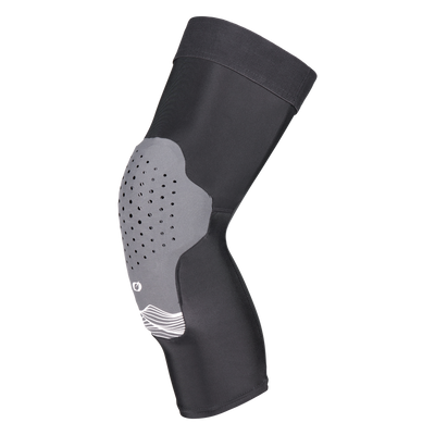 Der O'NEAL DIRT 1.0 Knieschützer ist ein schwarz-grauer Knieschützer mit einem konturierten, perforierten Polster zum Schutz und einem weißen Wellenlinien-Design, das flexiblen, ergonomischen Halt bietet.