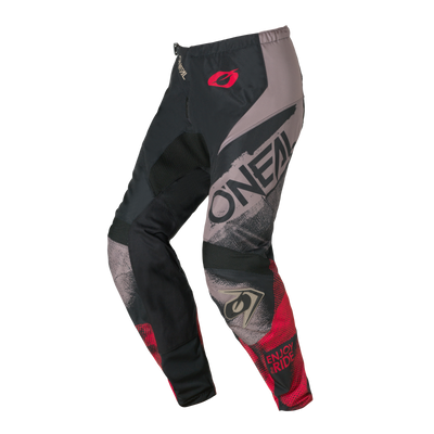 Die O'NEAL ELEMENT Pants ROLLER in grau/rot hat eine auffällige Grafik mit dem O'NEAL-Logo und "ENJOY RIDE" am unteren Bein.