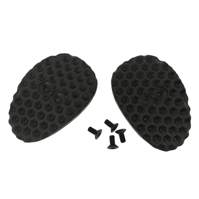 Bild des O'NEAL Cleat Cover Set für SPD-Schuhe, bestehend aus zwei schwarzen, ovalen Gummi-Traktionspads mit sechseckigem Muster. Jedes Pad hat zwei Löcher und vier dazwischen platzierte Schrauben, alle vor einem grünen Hintergrund. Marke: O'NEAL.